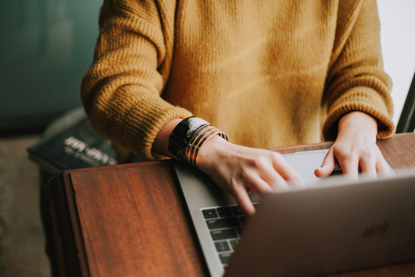 Working comfortably on a laptop at a home desk